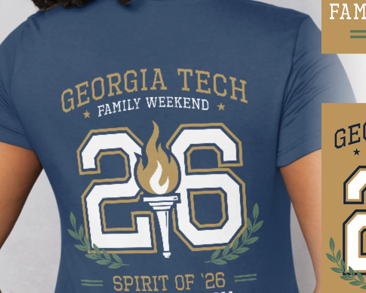 Georgia Tech Family Weekend tee showing the Spirit of '26 torch artwork in navy and old gold